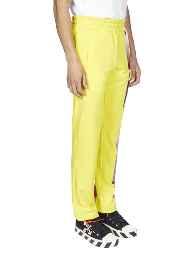 Shop Palm Angels Striped Panel Logo Track Pants In Yellow
