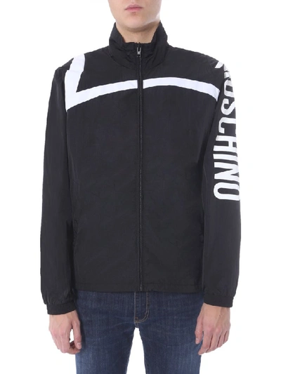 Shop Moschino Logo Zip Up Jacket In Black