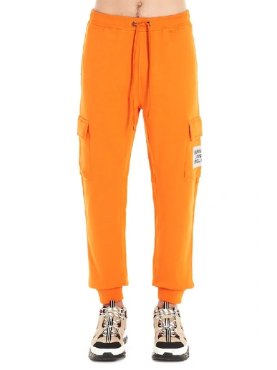 Shop Burberry Logo Print Track Pants In Orange