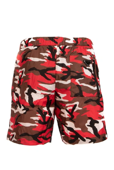 Shop Prada Camouflage Printed Swim Shorts In Bruciato+navy