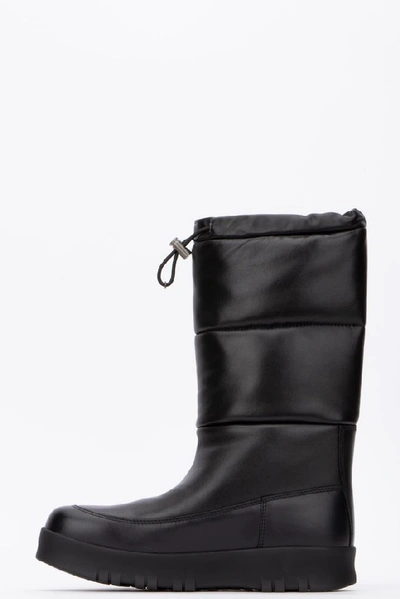 Shop Prada Quilted Moon Boots In Black