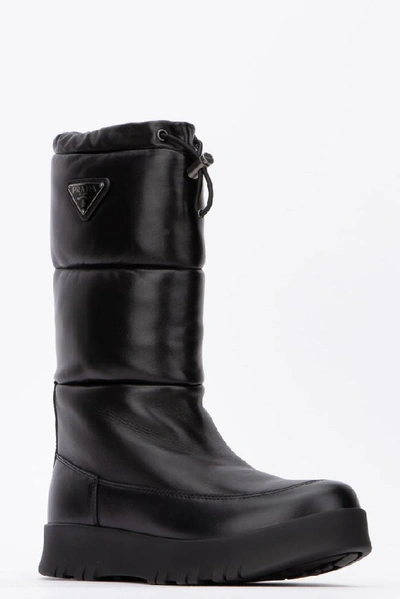 Shop Prada Quilted Moon Boots In Black