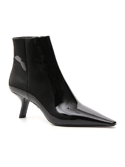 Shop Prada Stiletto Ankle Boots In Black