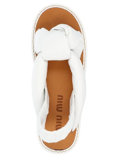 Shop Miu Miu Knotted Sandals In White