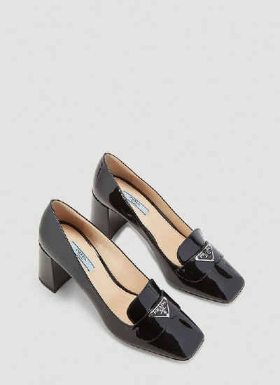 Shop Prada Logo Plaque Pumps In Black