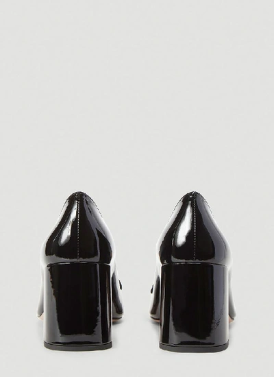 Shop Prada Logo Plaque Pumps In Black