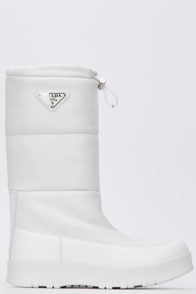 Shop Prada Quilted Moon Boots In White