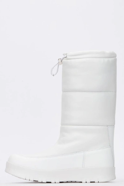 Shop Prada Quilted Moon Boots In White