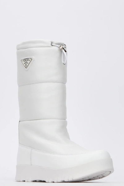 Shop Prada Quilted Moon Boots In White