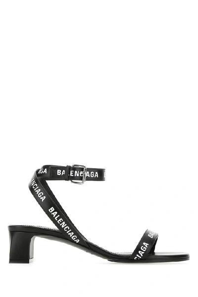 Shop Balenciaga Logo Printed Strap Sandals In Black