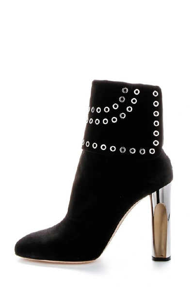 Shop Alexander Mcqueen Eyelet Detail Ankle Boot In Black