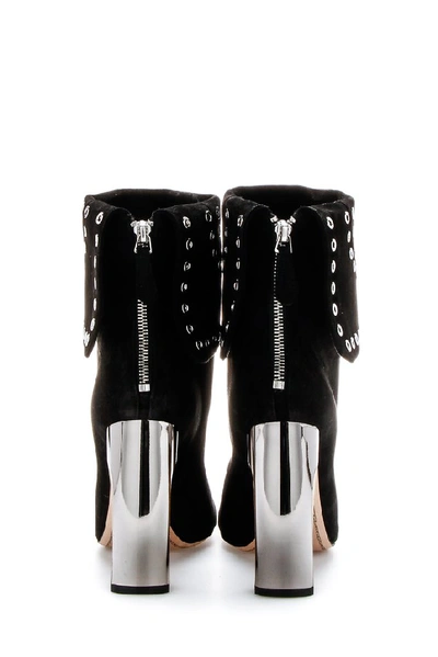 Shop Alexander Mcqueen Eyelet Detail Ankle Boot In Black