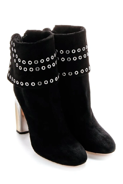 Shop Alexander Mcqueen Eyelet Detail Ankle Boot In Black