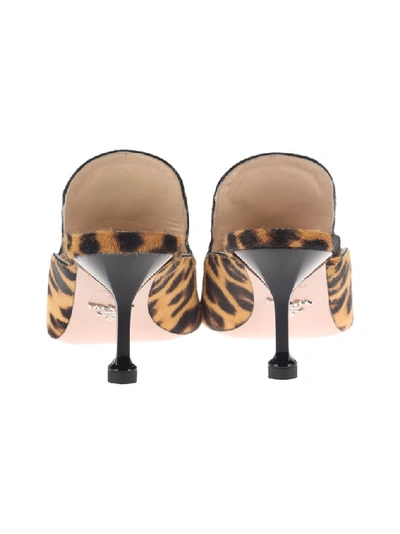 Shop Prada Animal Print Mules In Brown