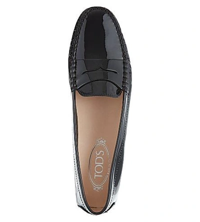 Shop Tod's Gomma Patent Leather Moccasins In Black