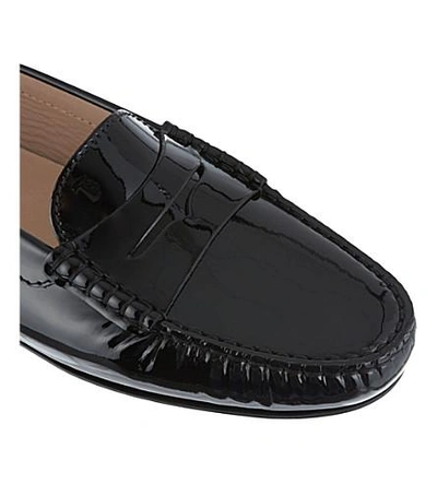 Shop Tod's Gomma Patent Leather Moccasins In Black