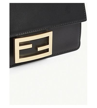 Shop Fendi Flat Baguette Mini Leather Bag In Black