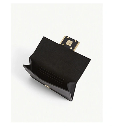 Shop Fendi Flat Baguette Mini Leather Bag In Black