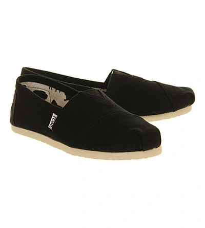 Shop Toms Classic Canvas Shoes In Black