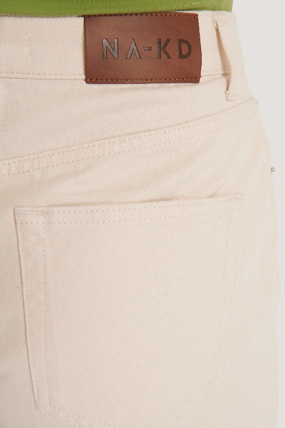 Shop Na-kd Folded Hem Denim Shorts Beige In Ecru