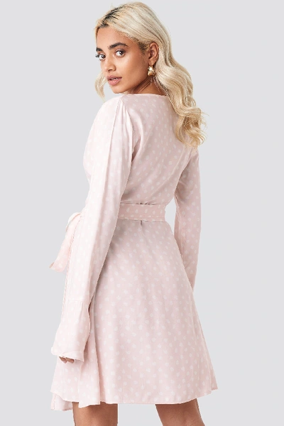 Shop Afj X Na-kd Dot Print Wrap Mini Dress - Pink