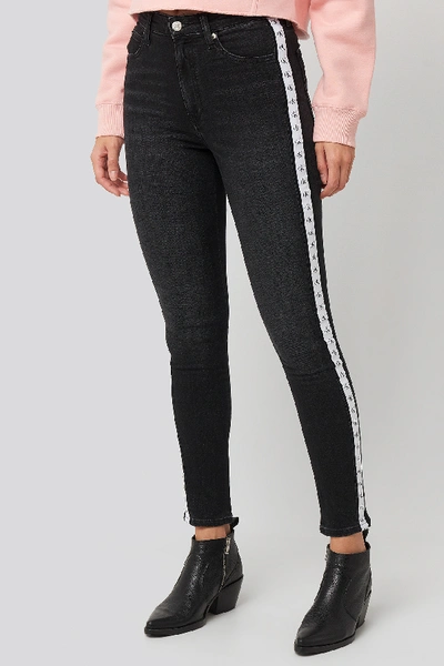 Shop Calvin Klein High Rise Skinny Ankle Denim Jeans Black In Black/black White Mono Tape