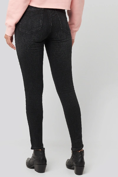 Shop Calvin Klein High Rise Skinny Ankle Denim Jeans Black In Black/black White Mono Tape