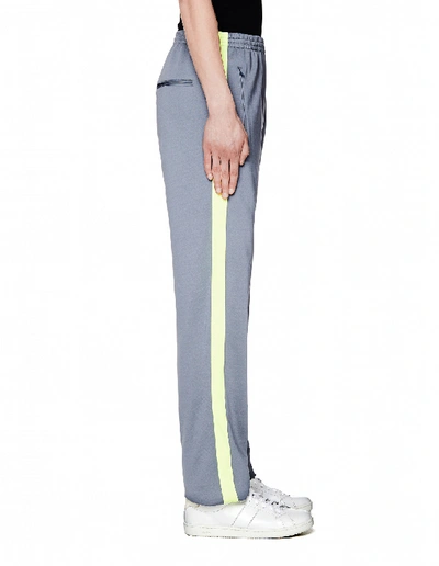 Shop Balenciaga Grey Trackpants With Neon Stripes