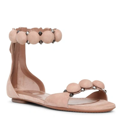 Shop Alaïa Bombe Beige Suede Flat Sandal