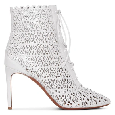 Shop Alaïa White Laser Cut Lace-up Ankle Boots