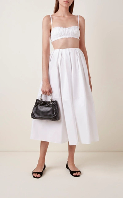 Shop Khaite Meryl Pleated Cotton Skirt In White