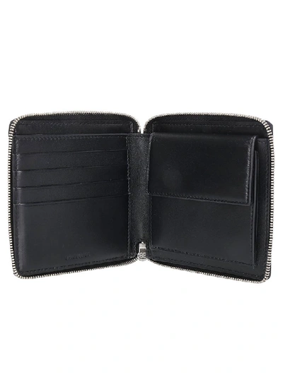 Shop Balenciaga Logo Zipped Wallet In Black