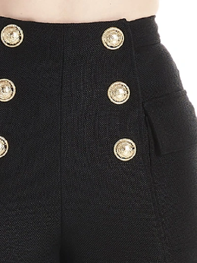 Shop Balmain High Waist Buttoned Flap Shorts In Black