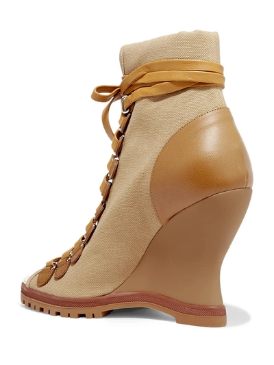 Shop Chloé River Canvas And Leather Wedge Ankle Boots