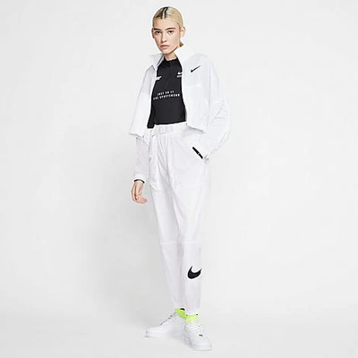 Shop Nike Women's Sportswear Woven Swoosh Jogger Pants In White