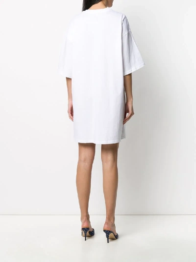 Shop Moschino Logo Print T-shirt Dress In White