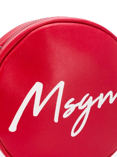Shop Msgm Logo-print Circle Crossbody Bag In Red