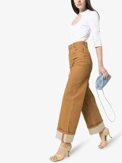 Shop Chloé Pleated Wide Leg Jeans In Neutrals