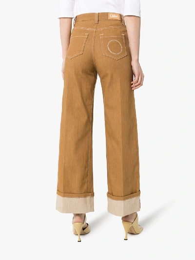 Shop Chloé Pleated Wide Leg Jeans In Neutrals