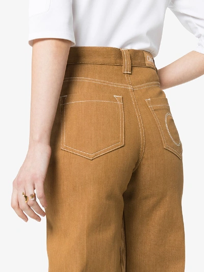 Shop Chloé Pleated Wide Leg Jeans In Neutrals