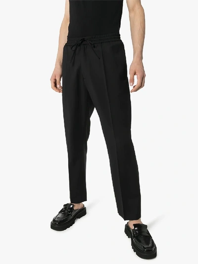 Shop Cmmn Swdn Tapered-hose Mit Kordelzug In Black