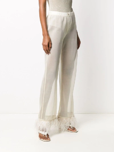 Shop Alanui Sheer Feather-trimmed Trousers In Neutrals