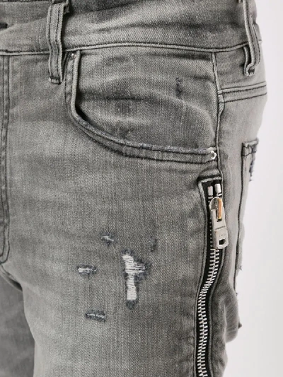 Shop Amiri Distressed Skinny Jeans In Grey