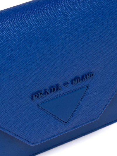 Shop Prada Lettering Logo Clutch In Blue