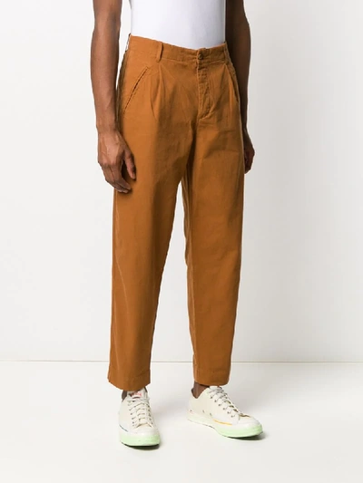 Shop Folk Pleated Tapered Leg Trousers In Brown