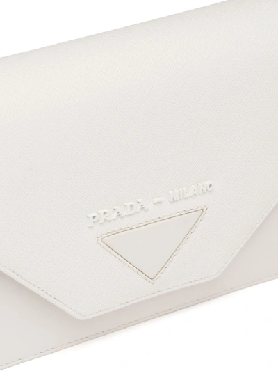 Shop Prada Lettering Logo Clutch In White