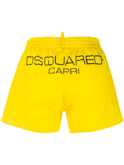 Shop Dsquared2 Logo Print Swim Shorts In Yellow