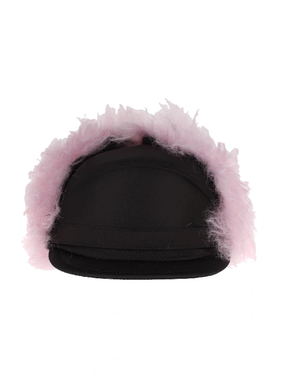 Shop Prada Faux-fur Flap Cap In Black+pink