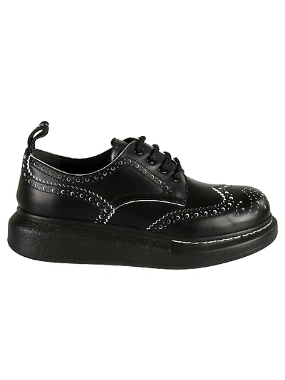 Shop Alexander Mcqueen Perforated Derby Shoes In Black/white