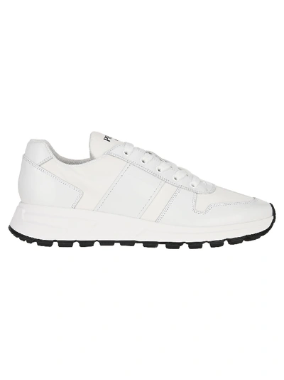 Shop Prada Fabric And Brushed Leather Sneakers In White